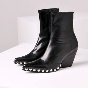 Walton Booties in Black
- Jeffrey Campbell
